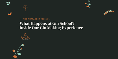A bottle of gin made at Gin School held up on the WhataHoot bar in King's Lynn